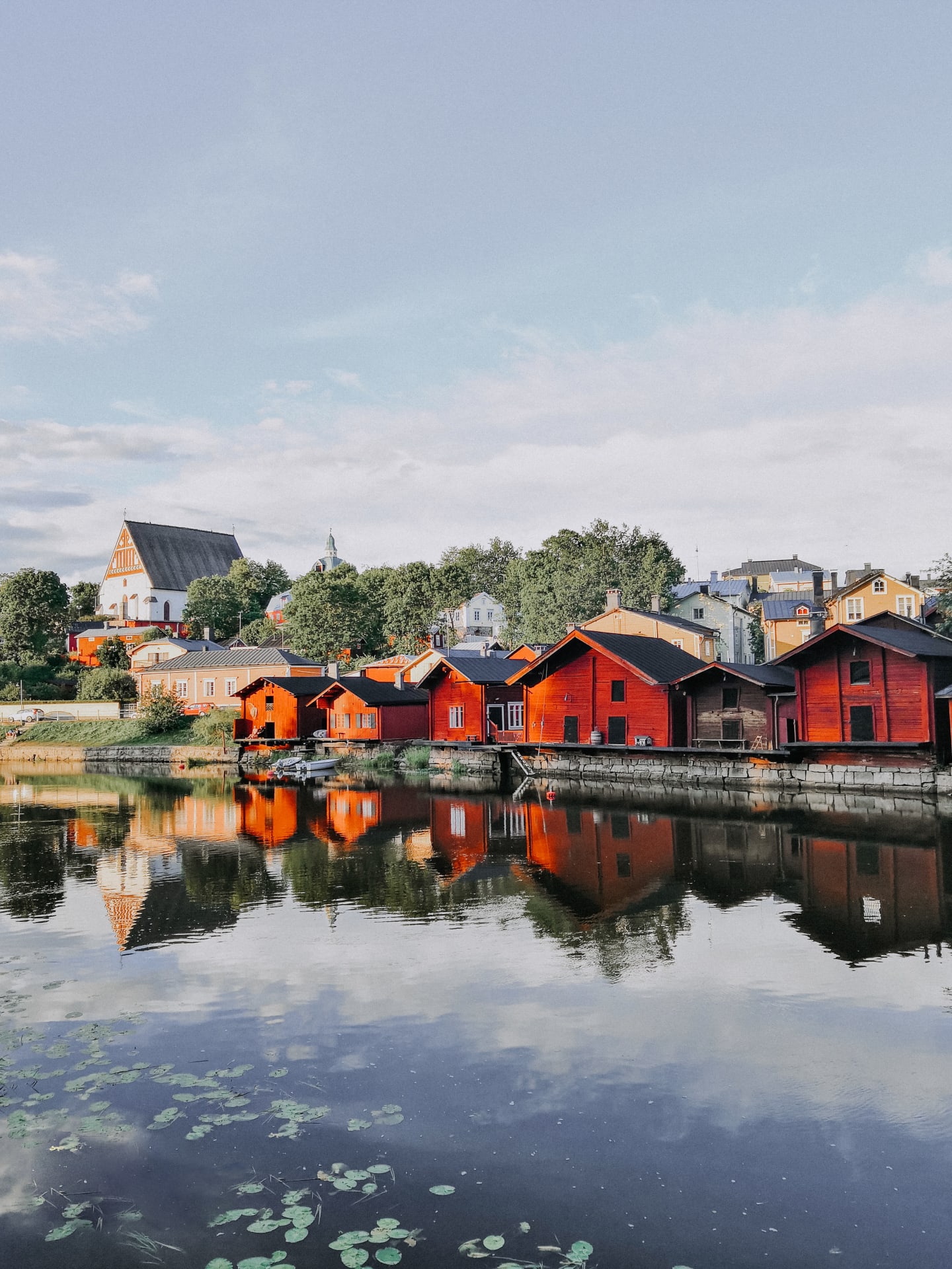 Red-ochre riverside warehouses