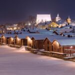 Red-ochre riverside warehouses