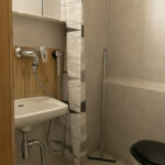 Toilet and shower in room number 6