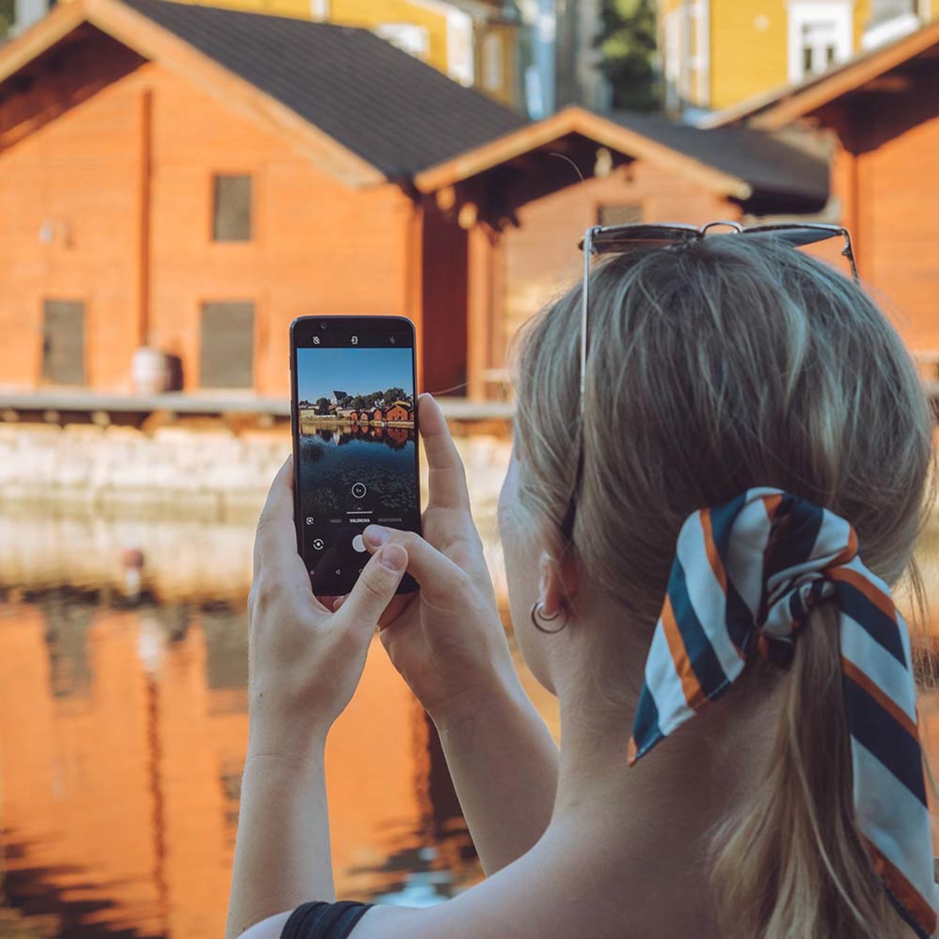 Red-ochre riverside warehouses