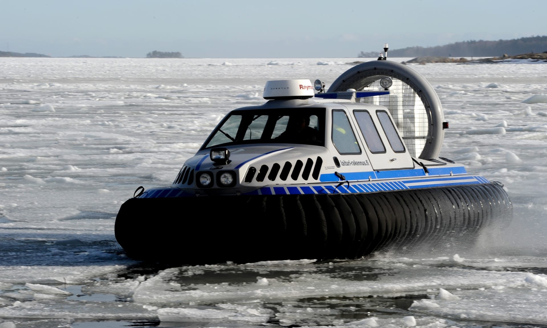The hovercraft takes us safely out over braking ice